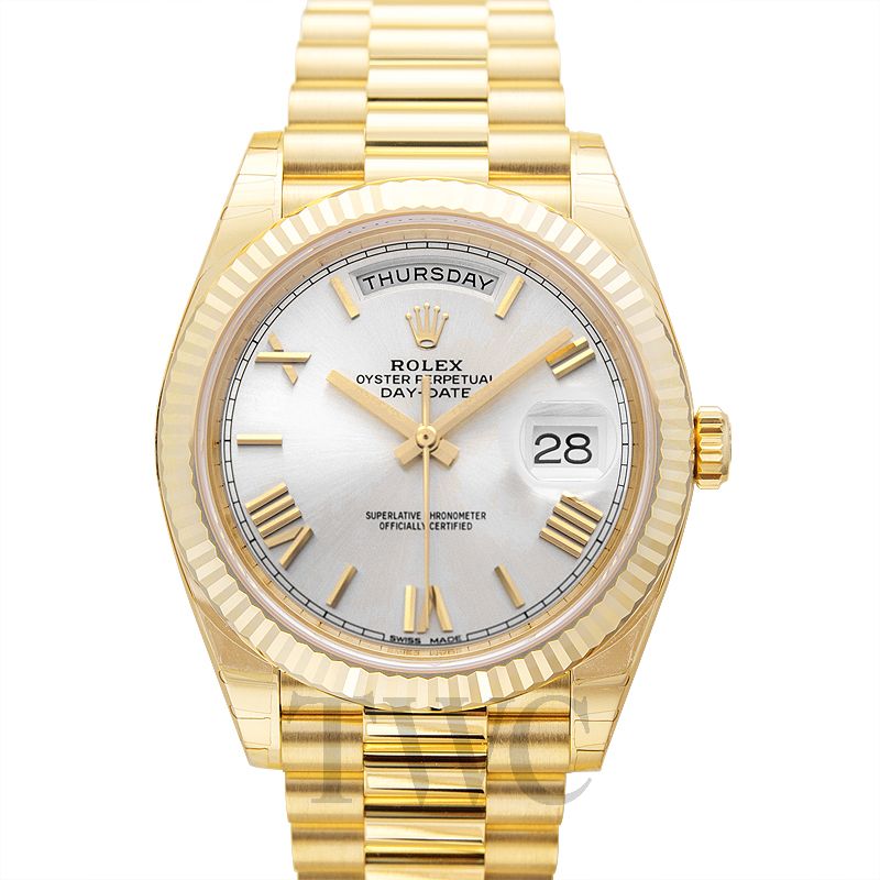 rolex day date gold silver